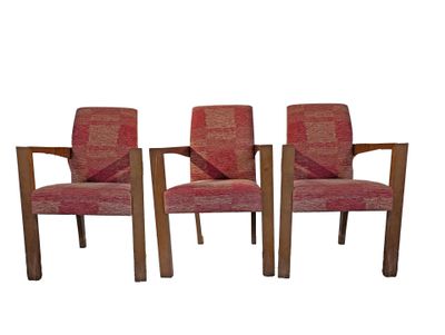 set of four mid century style chairs with red upholstered upholstered cushions