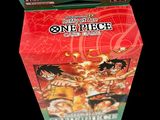 the box for one piece card game is open and ready to be played
