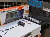 a box with a keyboard on top of it next to a box with a keyboard on it