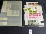 a lot of stamps on a table with a book