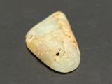 a piece of white jade with a design on it