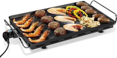 une photo d'un barbecue sur lequel sont disposés différents types d'aliments