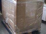 a large box on a pallet in a warehouse