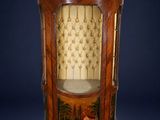 an image of a cabinet with a painting on it