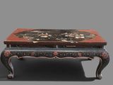 a black and red table with a flower design on it