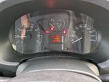 a close up of a car dashboard with a speedometer