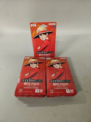 trois boîtes de cartes à collectionner d'anime « One Piece »