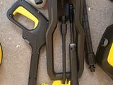 yellow and black tools laid out on the floor next to each other