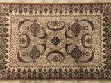 a close up of a rug on a bed with a white background
