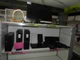 a lot of computer equipment on the shelves in the store