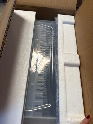 a box that has a microwave inside of it