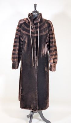 an image of a brown and black striped coat on a mannequin