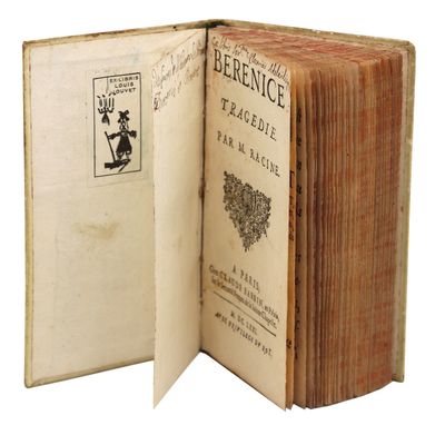 an open book with a picture of a cat on it