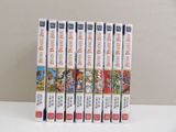 five books on a shelf that have chinese characters on them