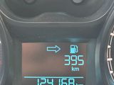 a close up of a speedometer on a car ' s dashboard