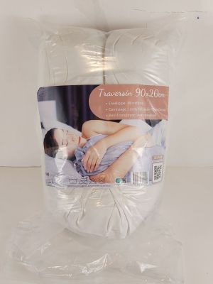 un sac contenant du linge de lit pour lit double, emballé dans du plastique
