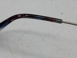 a pair of glasses that are sitting on a table