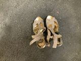 a pair of shoes that are on the ground