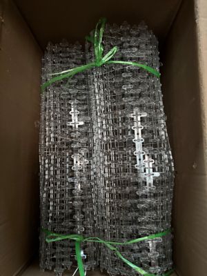 a cardboard box with a bunch of gabio nets in it