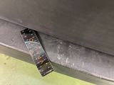 a close up of a ruler on the side of a car