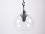 a close up of a clear glass light hanging from a ceiling