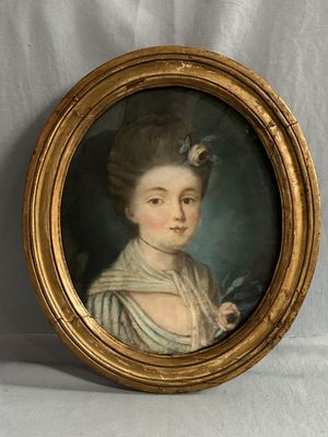portrait of a lady with a flower in her hair in a gold frame