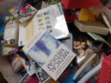 a pile of books sitting on top of a table