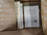 a box with a book inside of it on a table