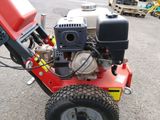 an image of a small engine on a lawn mower
