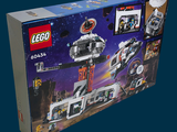 a box of legos with a space ship inside of it