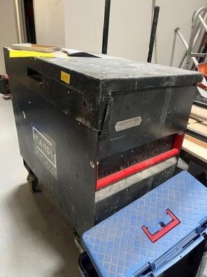 a black box with a blue box on top of it