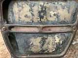 a close up of a motorcycle with a number plate on it