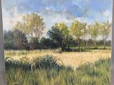 une peinture à l'huile représentant un champ avec des arbres et de l'herbe