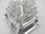 a lot of glass tubes that are sitting on a table