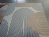 a rug that is on the floor in a room