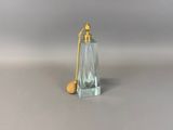 an image of a glass perfume bottle with a wooden stopper