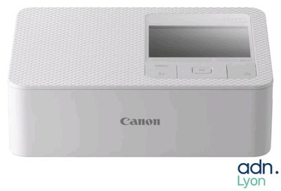 un gros plan d'une imprimante Canon sur fond blanc