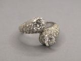 pair of two diamond rings sitting on top of each other