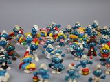 a lot of small figurines of different sizes and colors