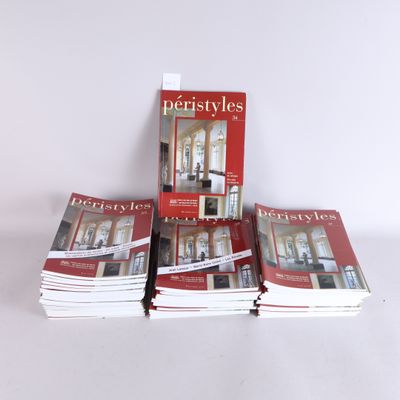 several books are stacked on top of each other on a table