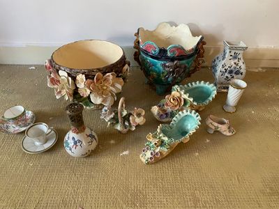 many different vases sitting on the floor next to each other