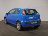 a picture of a small blue car parked in a showroom