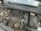 a car with its hood open with the hood up