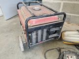 a small generator that is sitting on the ground