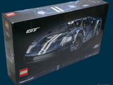 a box with a lego model of a race car in it