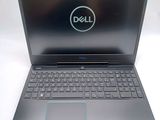 the dell laptop is open and ready to be used