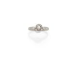 an engagement ring with a single diamond in the center