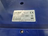 a close up of a blue box with a label on it
