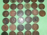 a lot of coins that are on a green surface