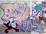 une photo montrant des graffitis sur le mur d'un immeuble